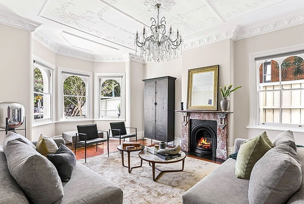 Townhouse living room with contempary and antique furniture