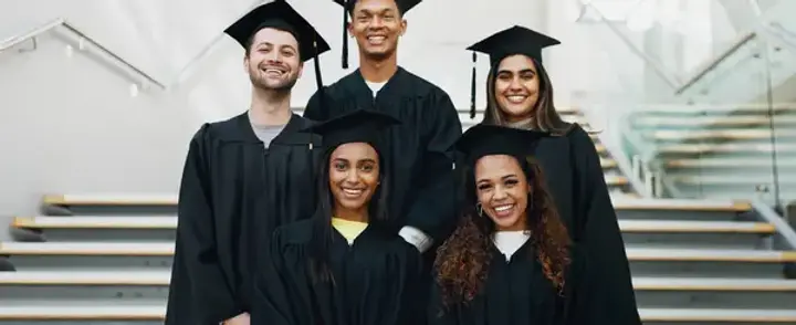 college students wearing caps and gowns