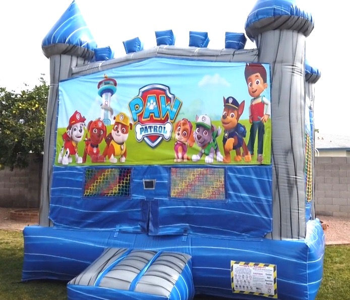 bounce house with banner