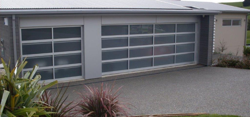 Architecturally designed garage doors
Flat panel garage door
Sectional flat panel insulated garage door.
Custom Designed Garage door
Flush Mount Door
Glass Garage Door