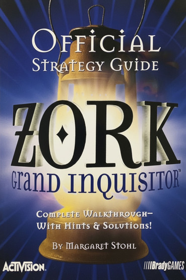Cover of the official strategy guide for Zork: Grand Inquisitor, featuring a glowing lantern casting light over the stylized game title in bold black and purple text. The background is a rich blue with radiating light beams, and the guide promises a complete walkthrough with hints and solutions. Logos for Activision and BradyGames are visible at the bottom.