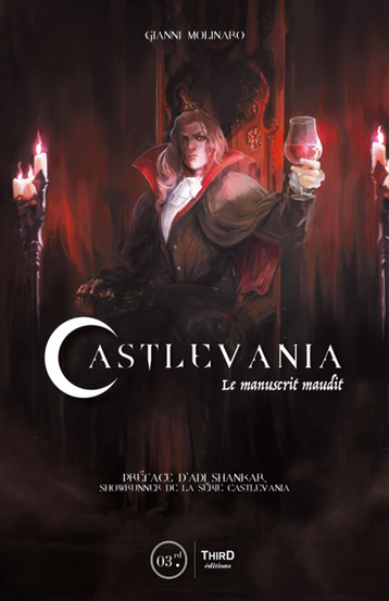 Cover of the French book Castlevania: Le manuscrit maudit by Gianni Molinaro. The illustration features a vampire character—resembling Dracula—sitting regally on a throne in a gothic, candle-lit setting. He has long, flowing hair, a red-lined cloak, and holds up a wine glass filled with red liquid. The background is dark and dramatic, with ornate details and glowing candles. The title is written in a sharp, elegant serif font, with the crescent-shaped "C" emphasizing the gothic horror theme. The book is published by Third Éditions and includes a preface by Adi Shankar, showrunner of the Castlevania Netflix series.