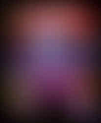 Cover of Games of the Living Dead featuring a large, cartoonish purple zombie with red shorts and exposed ribs, looming between a broken TV and a green tombstone. Bold, drippy white and red title text dominates the top. A red circle contains Japanese writing. The bottom reads “For All People Who Love Zombies!!!” with a skull nearby.