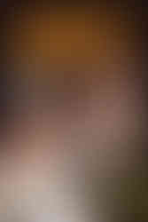 Cover of Mogel Power 2003 für PlayStation 2, a German cheat guide. A caricatured man with exaggerated facial features and yellow-tinted glasses aggressively grips a smoking PS2 controller. Discs are scattered around him, and a black PlayStation 2 console labeled “Mogel Power” is visible. The cover advertises "10.000 Cheats zu über 900 Spielen" (10,000 cheats for over 900 games) and features the logos "gamersbest" and "X Games."