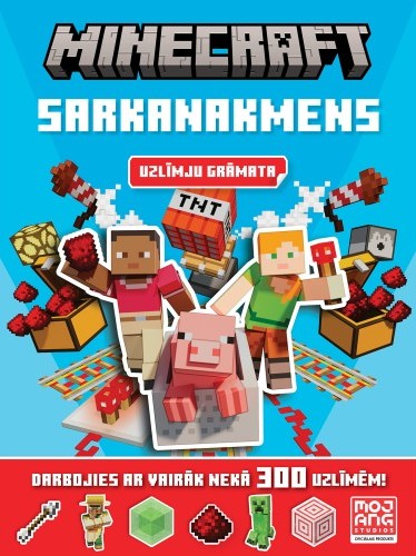 Latvian-language Minecraft: Redstone Puzzle Book cover, featuring blocky Minecraft characters Steve, Alex, and a pig surrounded by TNT, rails, redstone, tools, and redstone-themed items on a bright blue background. The cover includes Mojang Studios official product branding and text promoting more than 300 puzzles.