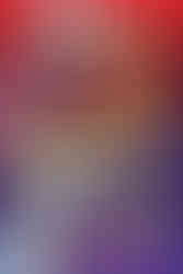 Cover of the Pokémon Scarlet and Violet Handbook featuring Legendary Pokémon Koraidon at the top against a red background and Miraidon at the bottom against a purple background. Decorative gold borders frame the design, with text highlighting stats and facts on 400 Pokémon from the Paldea region. Published by Scholastic.