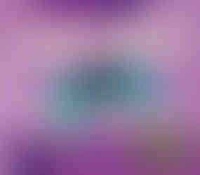 The image is the cover of a book titled "MAKING VIDEO GAMES" by Tom Streissguth. The cover features a large, central image of a blue video game controller with black buttons and joysticks. The controller appears to be floating and has a yellow outline around it, creating a sense of depth. Below the controller, there's a VR (virtual reality) headset, suggesting that the book covers contemporary video game technology including VR gaming. The background of the cover is a purple hue with pixelated heart shapes, indicating a theme associated with video games and digital design. The series name "MAKING MEDIA" is repeated at the bottom in a pattern, which implies that the book is part of a series related to media production. The overall design of the cover with its bold font and imagery is likely to attract readers interested in learning about the process of creating video games. It suggests that the content may include insights into game design, development, and the technologies used in the industry.