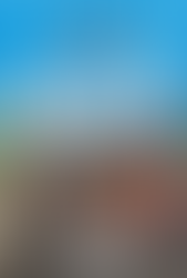 The book cover features a bright blue background with subtle geometric shapes and the “Pro Gamer Presents” logo at the top, alongside a circular badge reading “100% Unofficial.” Centered in a bold white framed box is the title “The Definitive Guide to Roblox.” Below the title is a large group of diverse Roblox characters and fantasy-style figures gathered together on a city street backdrop with modern buildings behind them. The lineup includes classic blocky Roblox avatars alongside detailed characters such as dragons, armored warriors, robots, wizards, and other colorful game-inspired figures. At the bottom, large white numbers read “2023,” followed by the text “A Totally Independent Publication.”