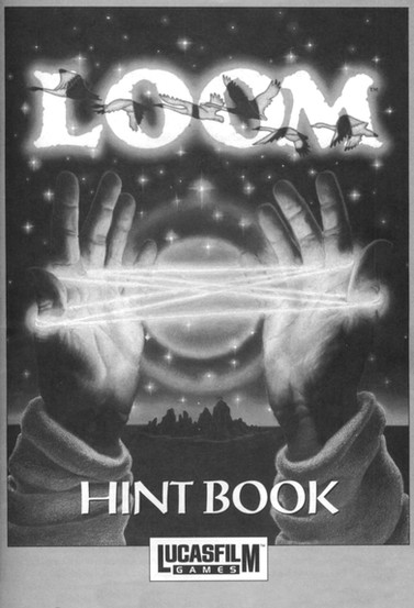 Black and white book cover for Loom Hint Book featuring two glowing hands weaving strands of light around a radiant orb under a star filled sky, with birds flying across the large Loom title at the top. The Lucasfilm Games logo appears at the bottom, emphasizing this as a fantasy adventure game guide.