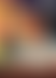 Illustrated cover of 40 Anos Desenhando Aventuras by Renato Degiovani, showing the author smiling at a keyboard with a backdrop of imaginative scenes including a helicopter, a speeding boat, a moonlit castle, and a treasure chest. The background transitions from sunset to night sky, evoking the spirit of adventure and storytelling. The title appears in bold navy text, accented by a vintage-style golden key.