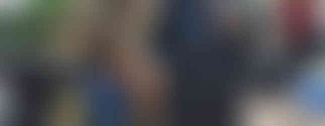 Little girl and dog with flowered collar