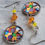 Miniature : boucles d'oreilles en acier inoxydable argenté, cabochons bonbons, perles orange et jaune