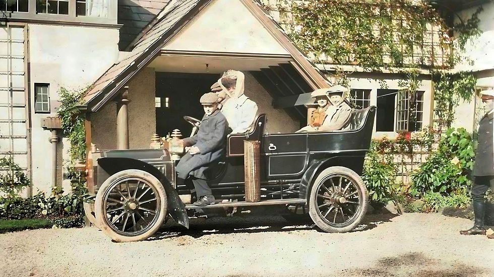 The Currer-Briggs' new car in the courtyard