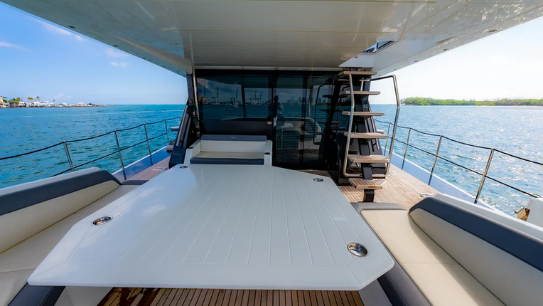 A dining area on the deck of the 64' Galeon