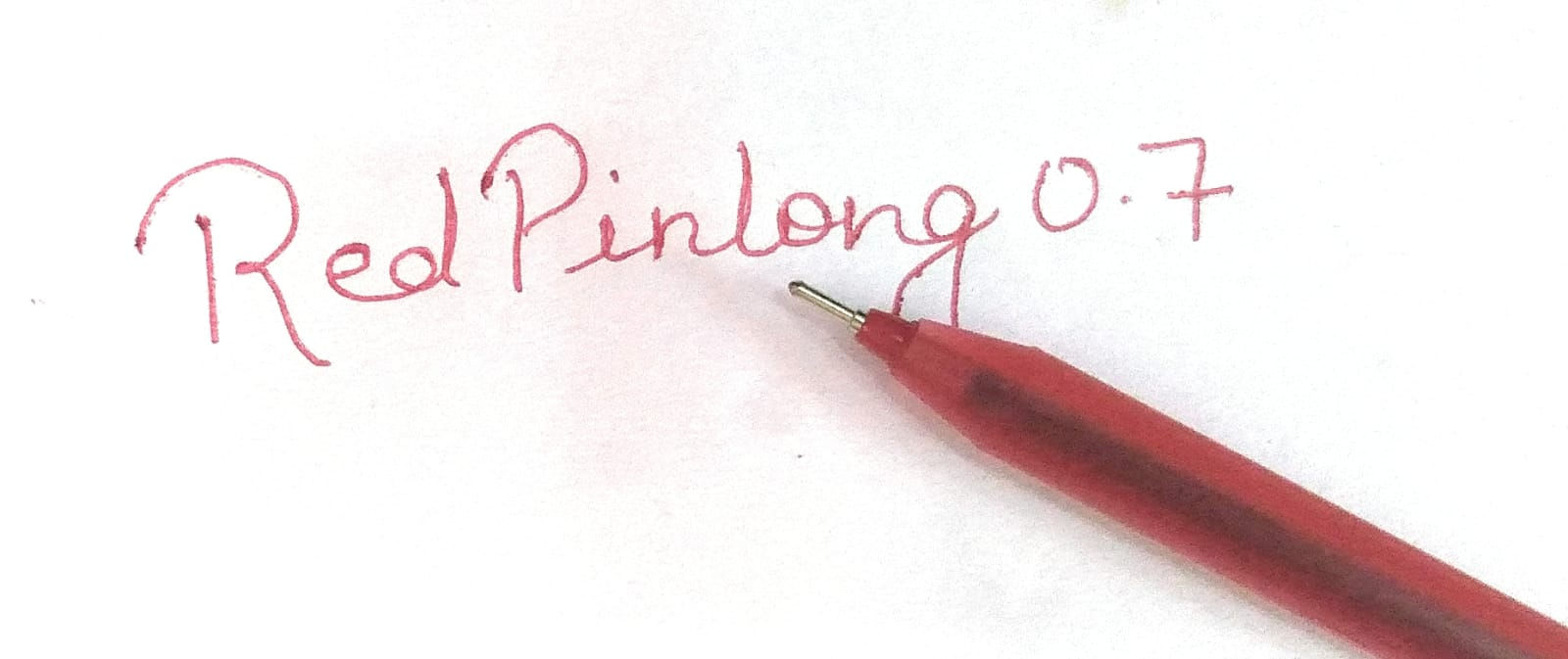 Front view of SS Pin Long Ball Pen 0.7 Pack Of 20 highlighting the brand S.S.