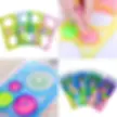 Kids birthday return gift set featuring colorful spirograph geometric rulers