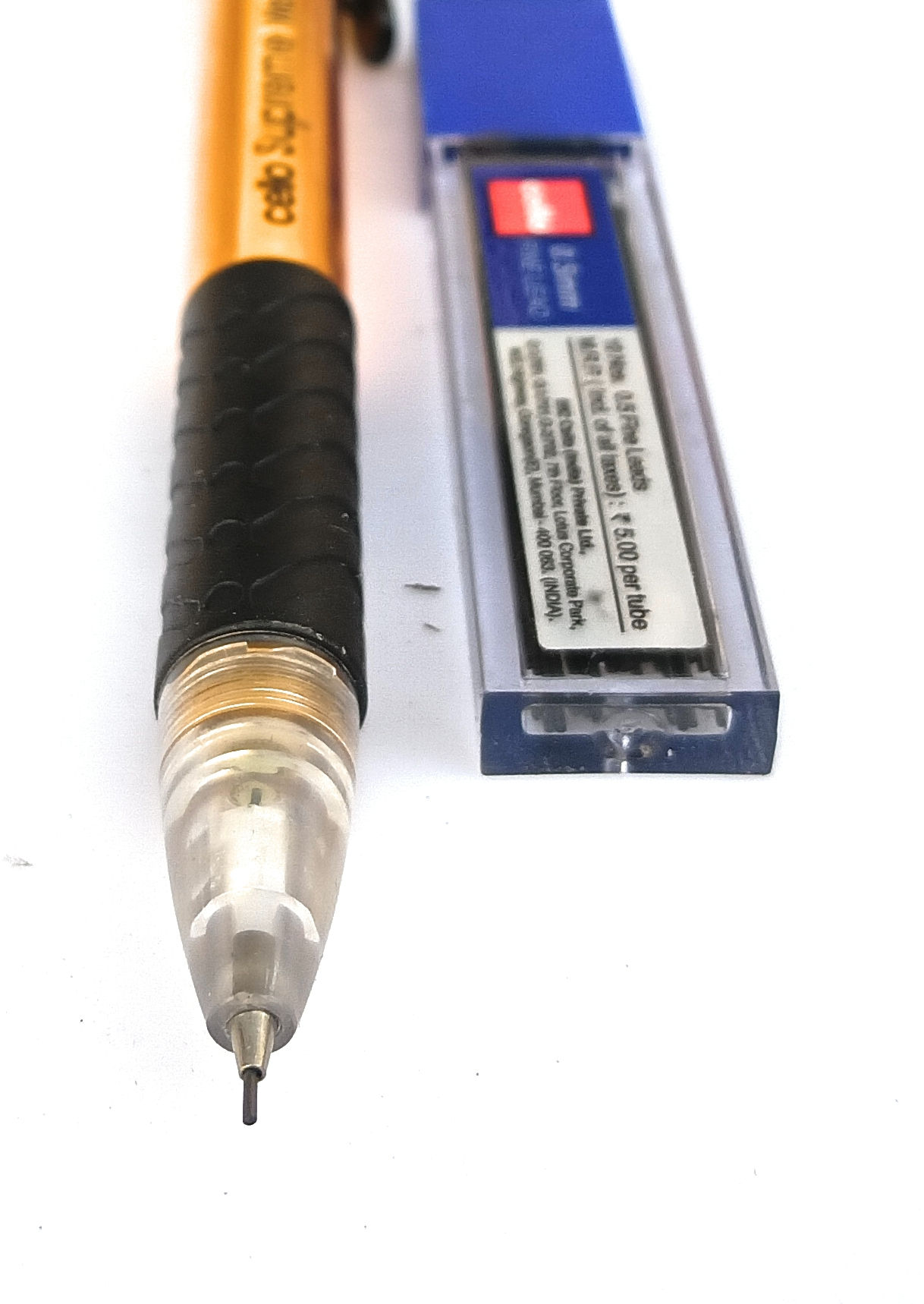 Close-up view of mechanical lead pencil tip sizes 0.5 mm, 0.7 mm, 0.9 mm with included lead refill box