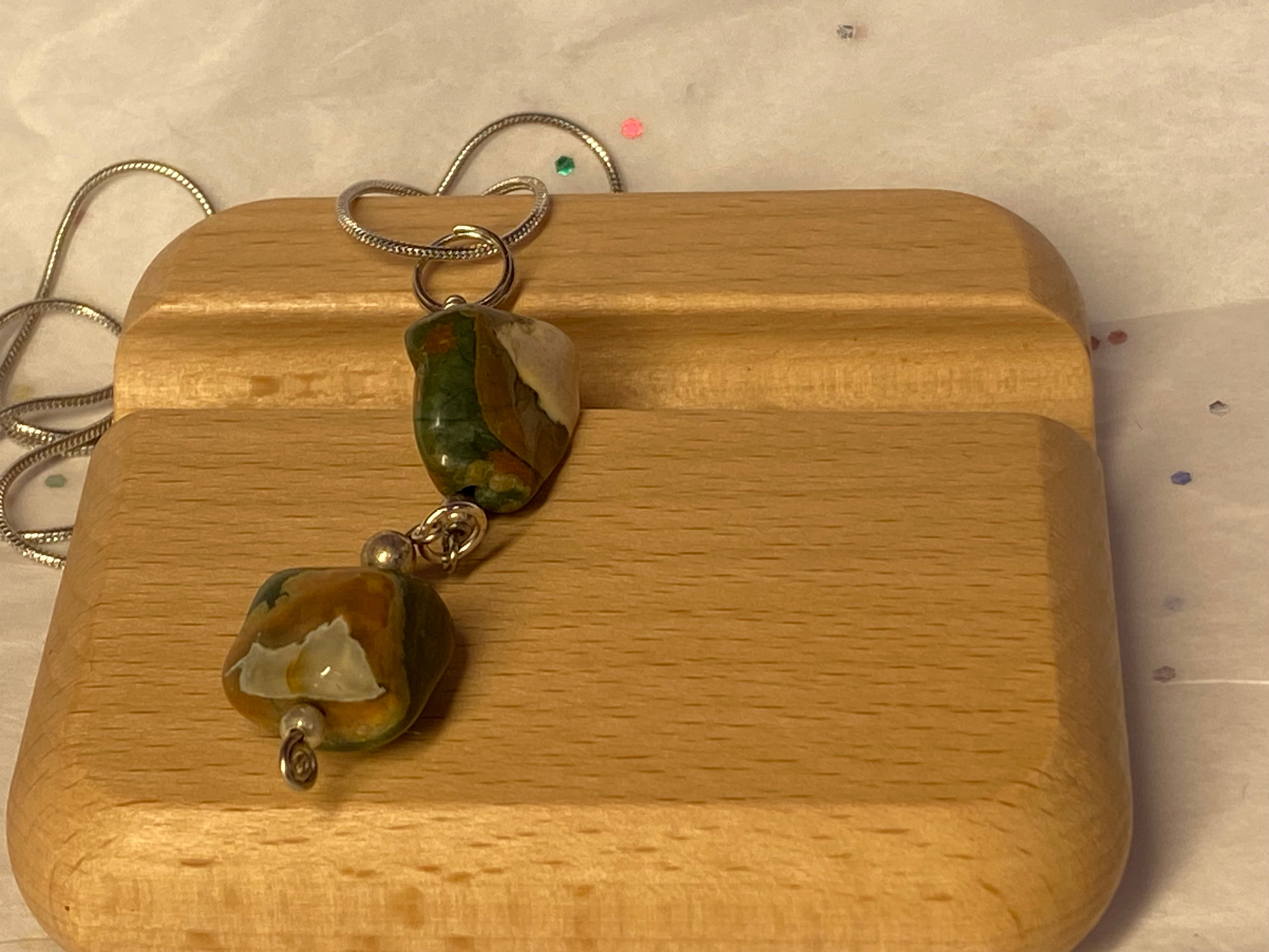 two pendant gems