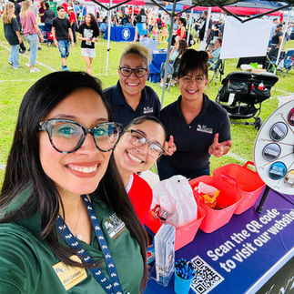 BAFCU employee Mari taking a selfie with CU employees Kelina, Joanne, and Sonia