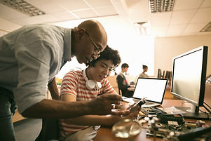 Teacher Assisting a Student_edited.jpg