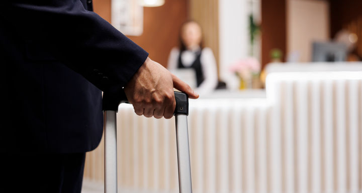 businessman-arriving-hotel-lobby.jpg