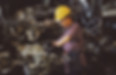 woman-wears-yellow-hard-hat-holding-vehi