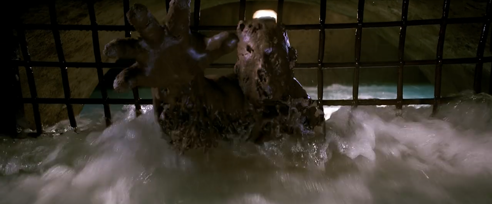 Sandman is dissolved in water and nearly killed by Spider-Man wearing the Venom symbiote.