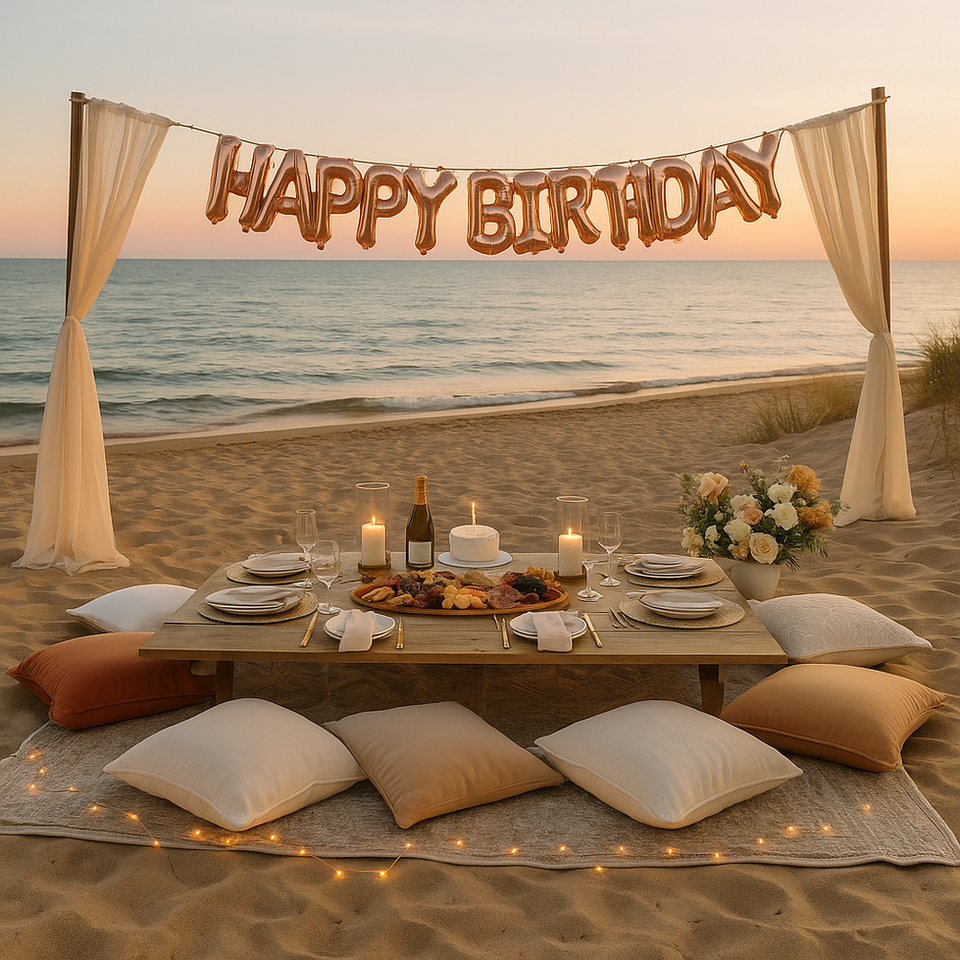Birthday picnic celebration with balloons, charcuterie board, and flowers Lake Michigan