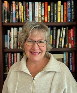 Lisa Harris bio pic with books.jpg