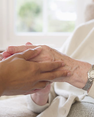 Elderly care hands holding