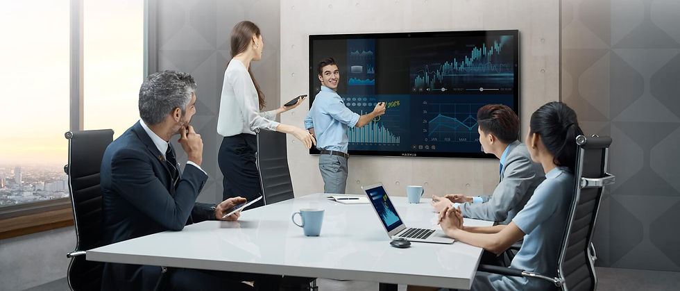 Close-up of a hand using a stylus on an interactive screen during a meeting