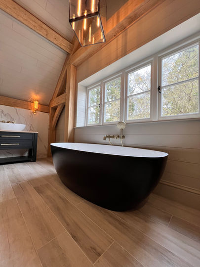 black bath, neutral walls, Little Greene