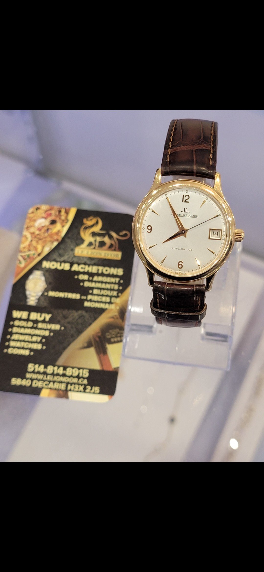 A classic leather-strap watch — Le Lion d’Or