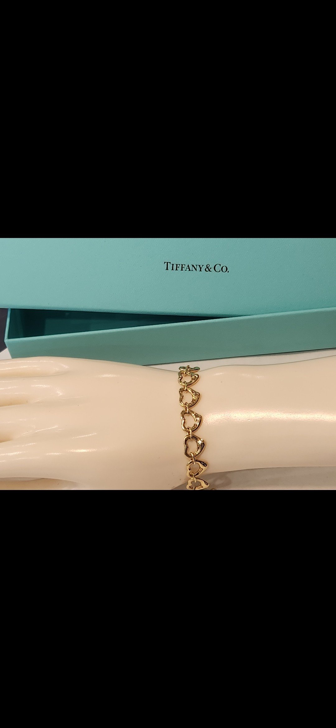 A gold bracelet — Le Lion d’Or