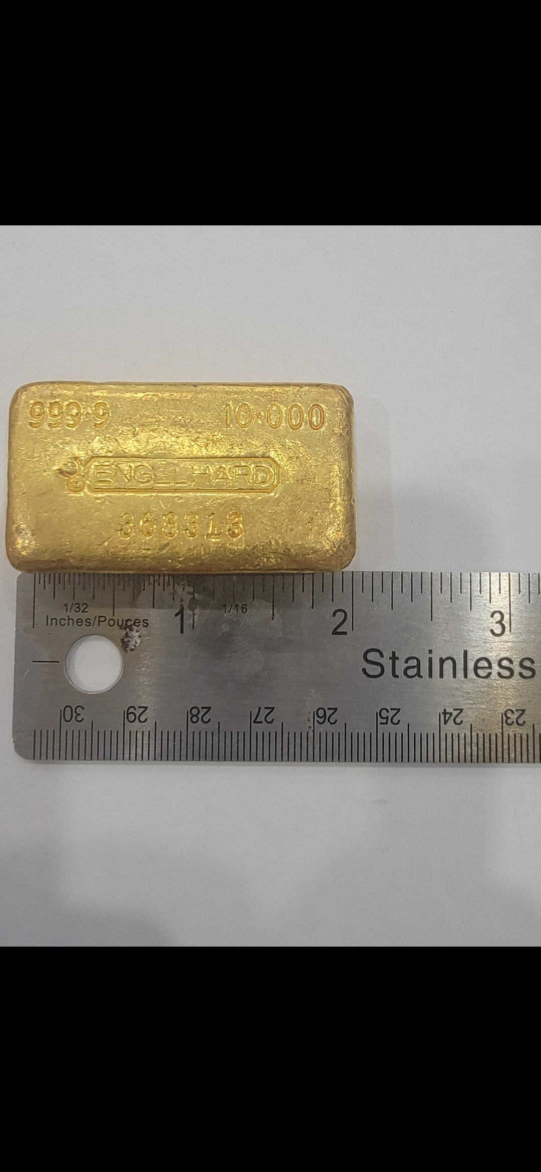 A cast gold bar — Le Lion d’Or