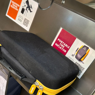 Portable Tire Inflator kit on library shelf