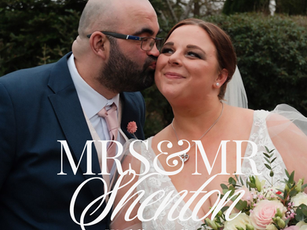 Bride and groom embracing after their ceremony in a countryside venue