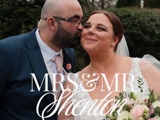 Bride and groom embracing after their ceremony in a countryside venue