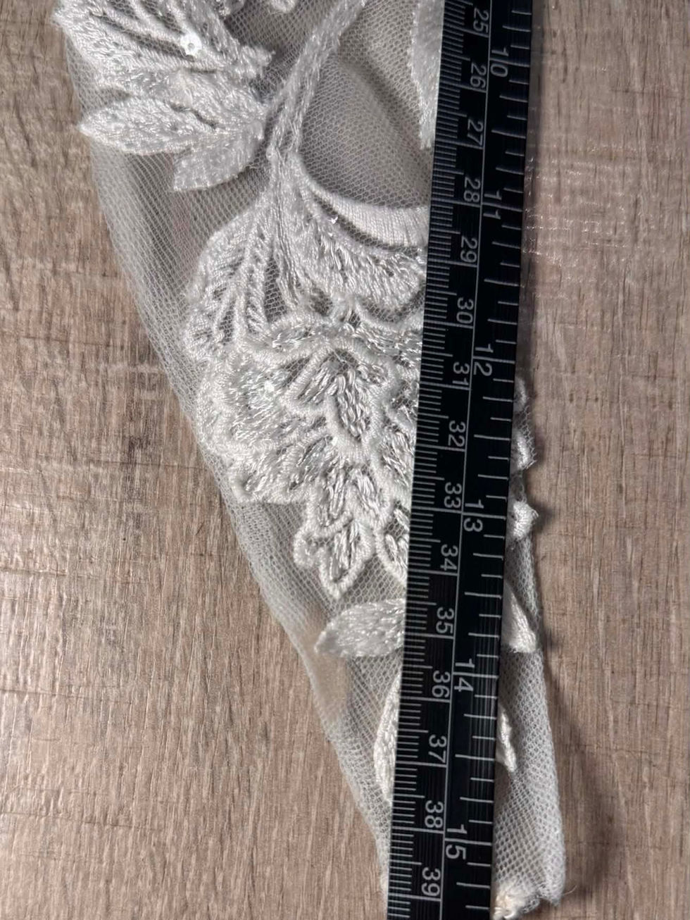 Ivory botanical lace off shoulder wedding dress straps on illusion tulle at Wedding Belles Love bridal boutique in Stone