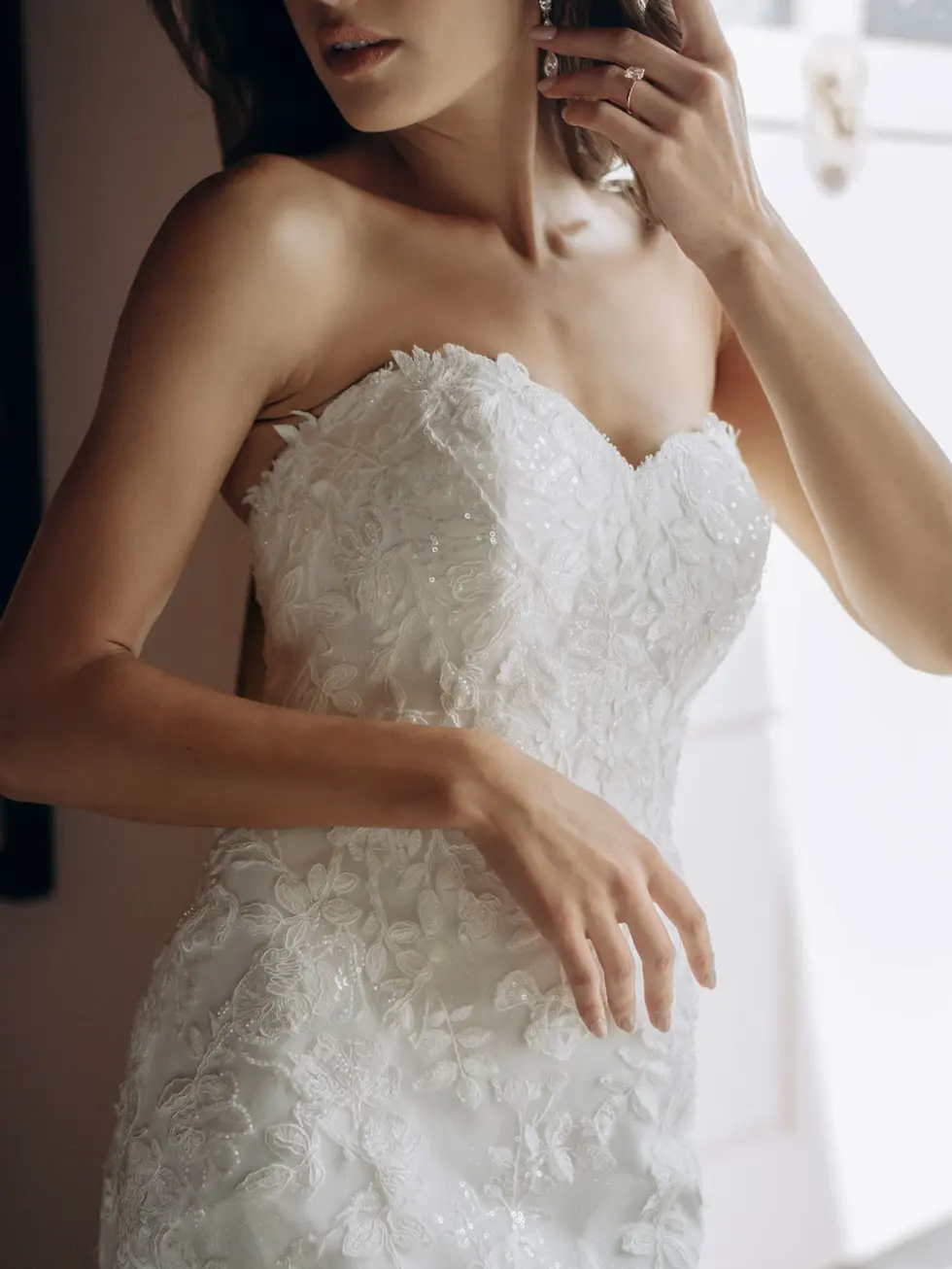 Stella York SY8332 trumpet wedding dress at Wedding Belles Love Staffordshire featuring romantic floral lace