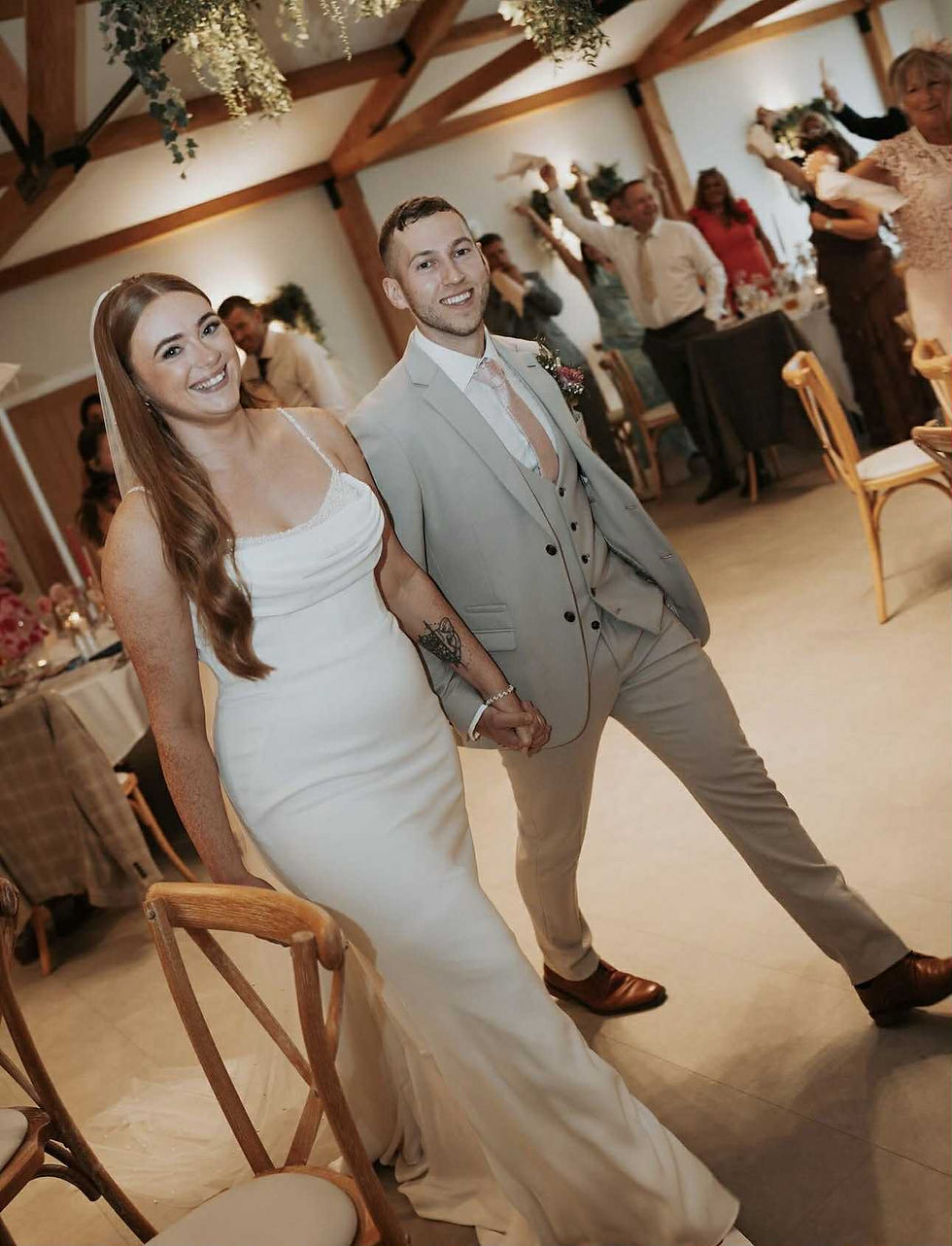 Minimal plain wedding dress with thin straps and soft drape