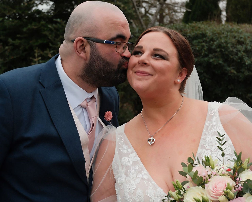 Joyful bride celebrating finding her dream dress in a cosy boutique 

