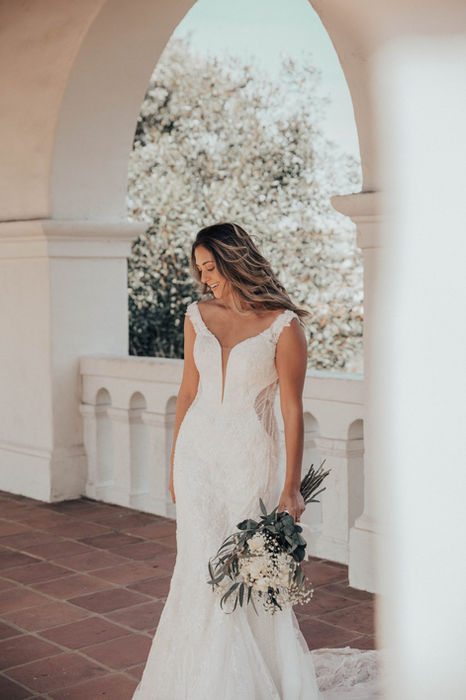 Martina Liana 1338 Odette fitted ivory lace wedding dress with plunging V-neckline, mocha lining and floral embellishments