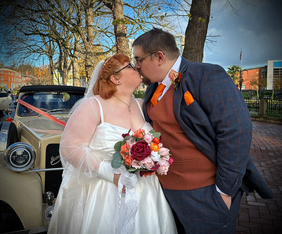 Bride smiling in her Stella York Mariette wedding dress at a village hall wedding.