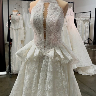 Elegant wedding dress with layered tulle skirt moving beautifully on the runway