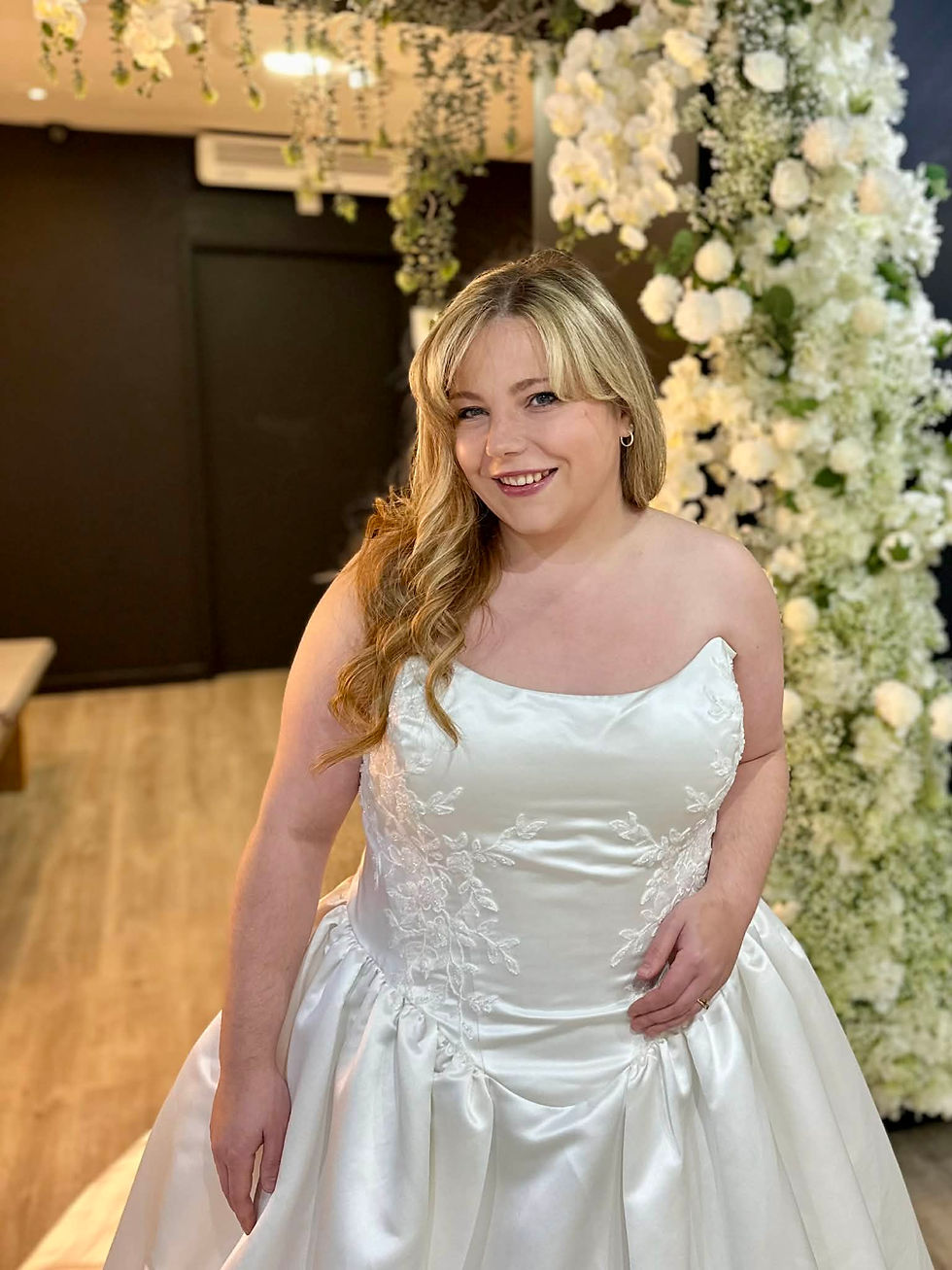 Interior of award winning Wedding Belles Love bridal boutique in Stone, Staffordshire, featuring modern bridal gowns and a welcoming atmosphere.