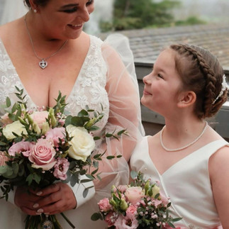 Intimate wedding moment captured between bride and groom
