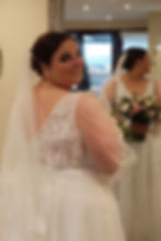 • Bride standing outside wedding venue in Stone Staffordshire on her wedding day