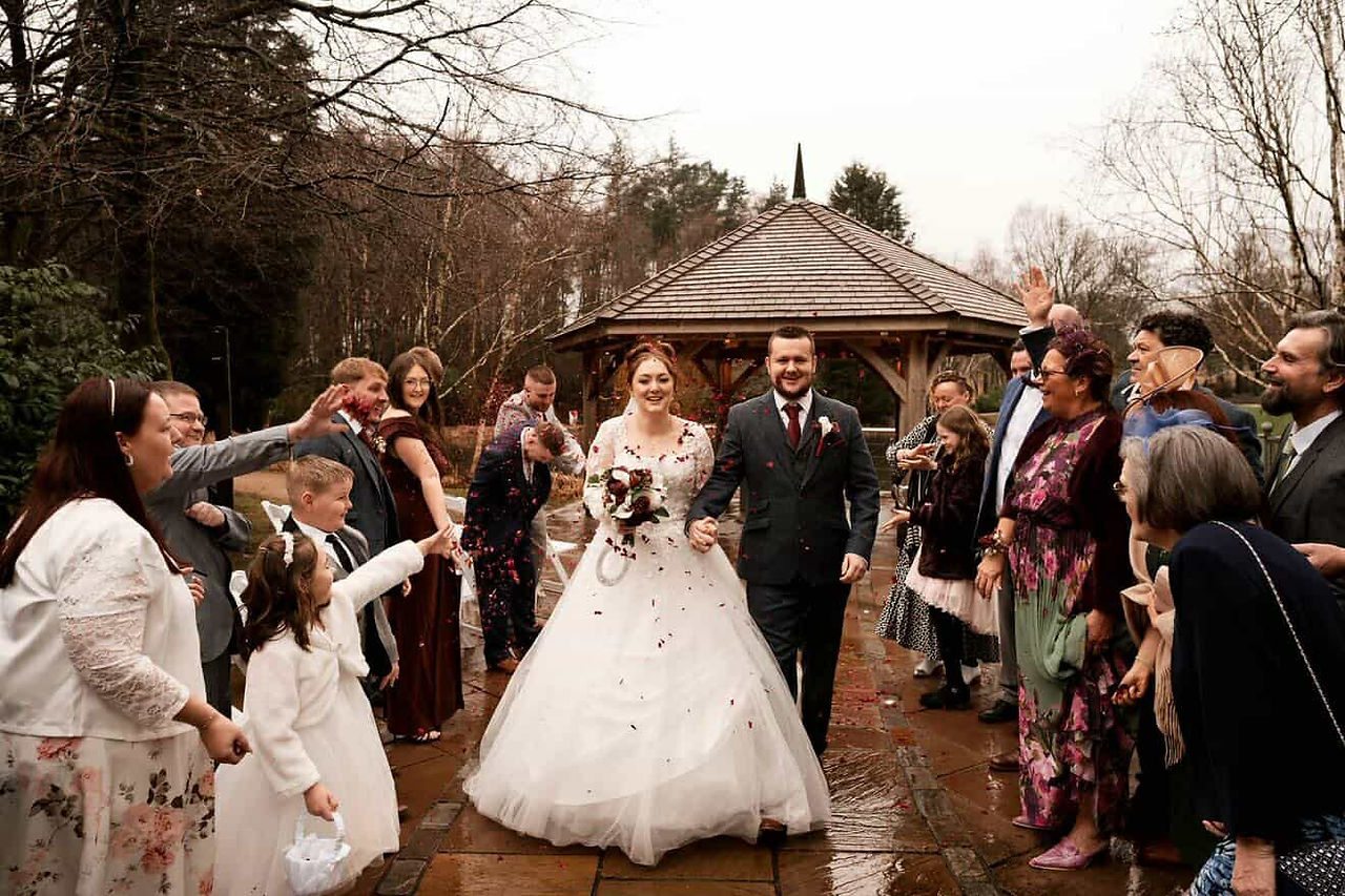 Bride portrait in fairytale princess wedding dress with lace jacket and floral details