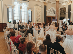 Final runway look featuring all brides and staff